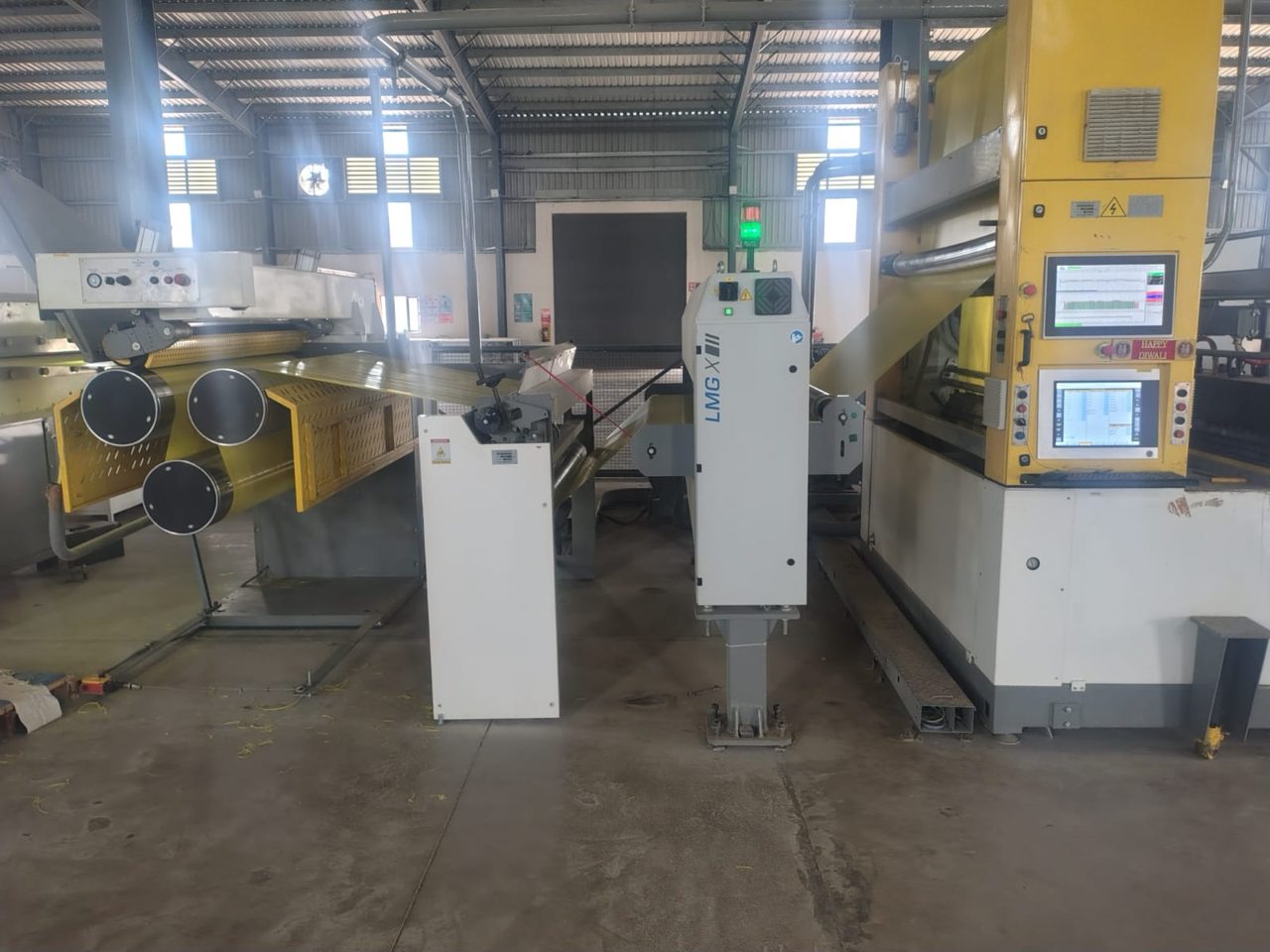 Tape line with LMGX winder and cheese rolls